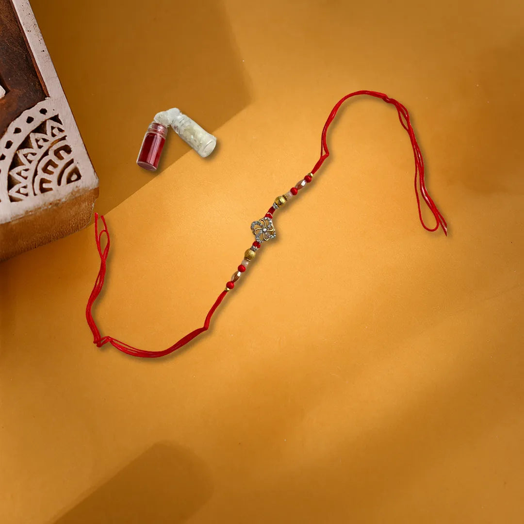 Imperial American Diamond Flower Thread Rakhi