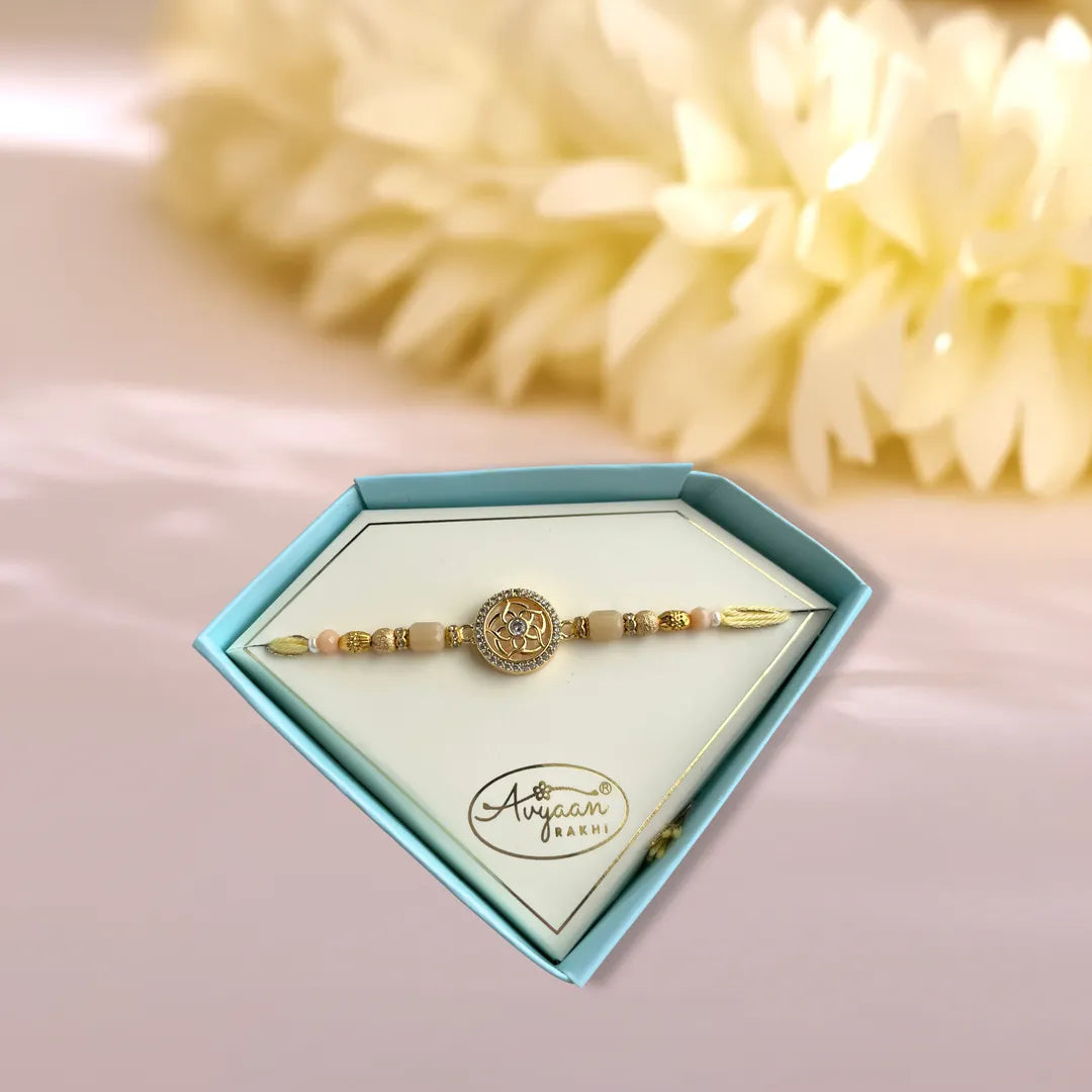 Circular Flower American Diamond Studded Pastel Thread Rakhi