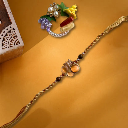 Beige Crystal American Diamond Knot Thread Rakhi