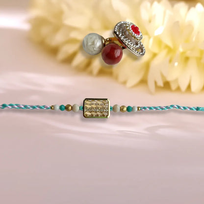 Rectangular Rice And American Diamond Pastel Thread Rakhi