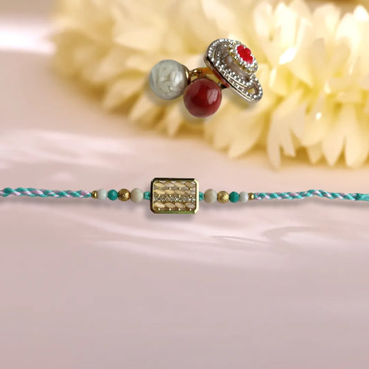 Rectangular Rice And American Diamond Pastel Thread Rakhi