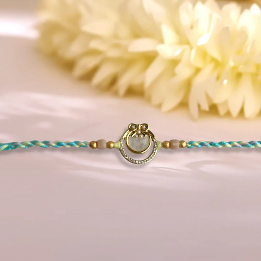 Mother of Pearls American Diamond Pastel Thread Rakhi